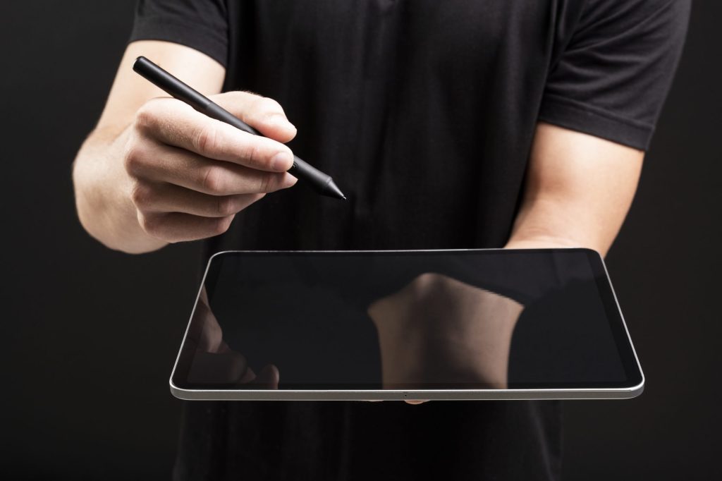 businessman holding tablet writing invisible screen with stylus social media cover