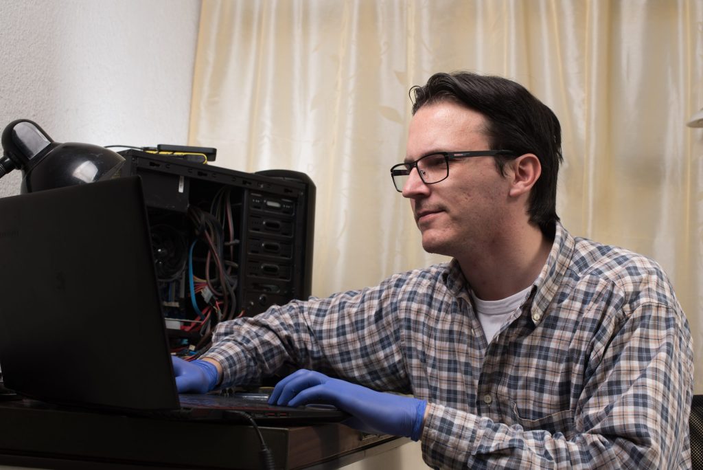 man using laptop